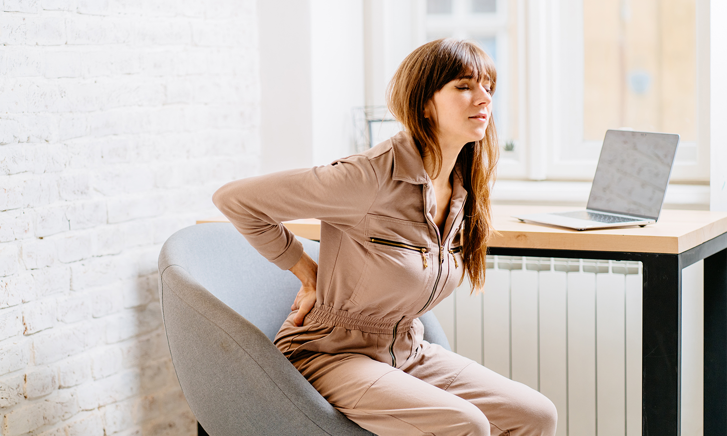 Desk Job Destroying Your Spine? 5 Reasons You Need Cold Laser Therapy for Back Pain